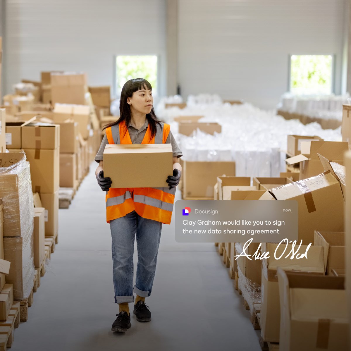A notification from Docusign asks a user to sign a procurement agreement